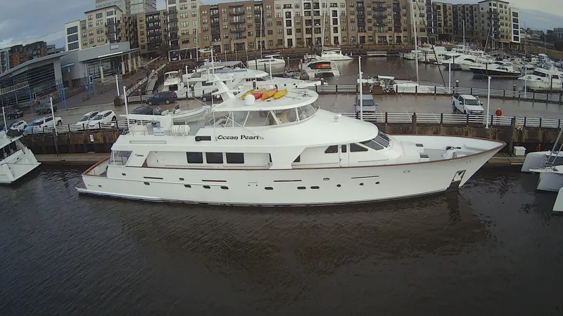 Slide: The Image of Christensen Custom 1988 luxury yacht docked in harbor. - 4