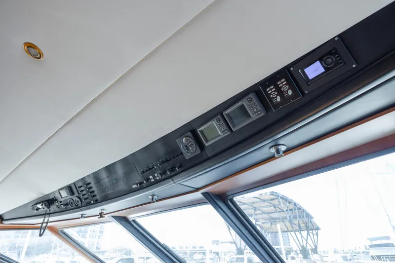 Slide: The Image of Interior view of a 1988 Christensen Custom yacht control panel. - 41