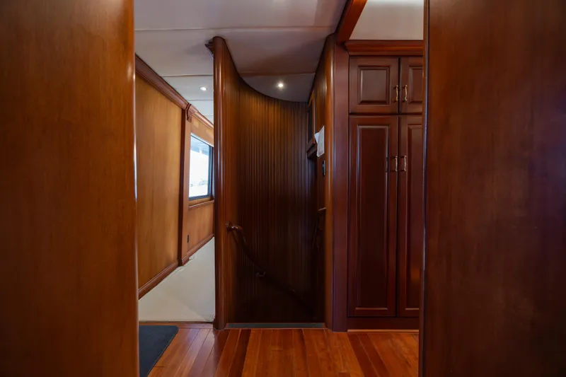 Slide: The Image of Interior of a 1988 Christensen Custom yacht with wooden finish. - 46