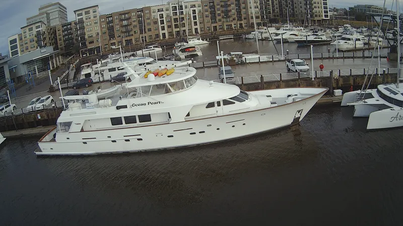 Slide: The Image of Christensen Custom 1988 luxury yacht docked in harbor. - 7
