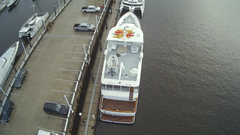 Slide: The Image of Aerial view of a 1988 Christensen Custom yacht docked. - 8