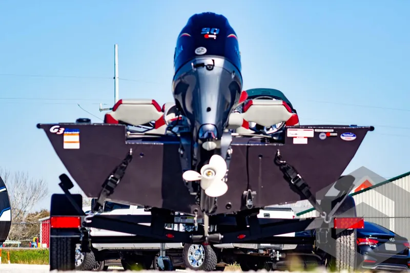 Slide: The Image of 2025 G3 Sportsman 1710 boat with outboard motor, rear view. - 10