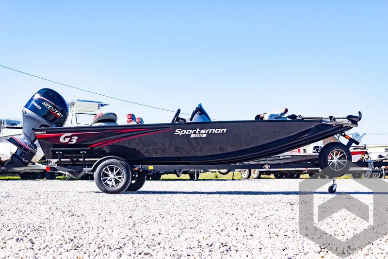 Slide: The Image of 2025 G3 Sportsman 1710 boat on trailer, side view, outdoors. - 17