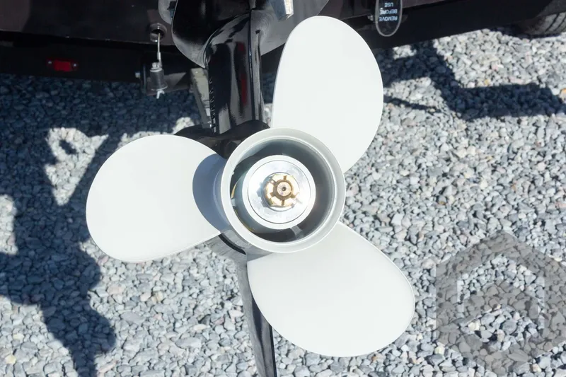 Slide: The Image of 2025 G3 Sportsman 1710 boat propeller on gravel background. - 30