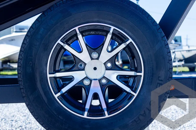Slide: The Image of Close-up of a 2025 G3 Sportsman 1710 trailer wheel with sleek alloy rim design. - 37