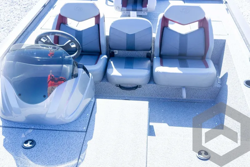 Slide: The Image of 2025 G3 Sportsman 1710 boat interior with three seats and steering console. - 49