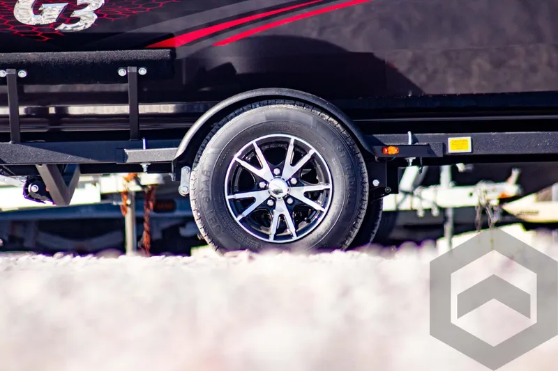 Slide: The Image of 2025 G3 Sportsman 1710 trailer wheel with sleek design and modern detailing. - 7