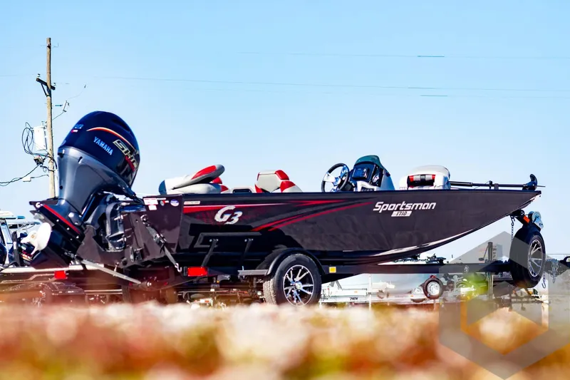 Slide: The Image of 2025 G3 Sportsman 1710 boat with Yamaha engine on trailer. - 9