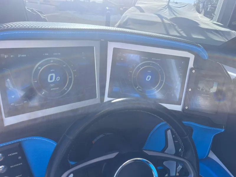 Slide: The Image of 2022 Centurion Ri265 dashboard with digital displays and steering wheel. - 8