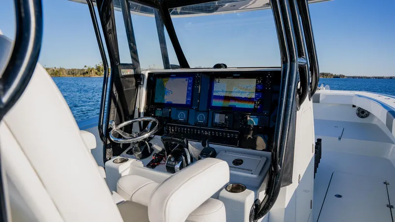 Slide: The Image of Freeman 34VH 2020 boat cockpit with advanced navigation system on open water. - 17