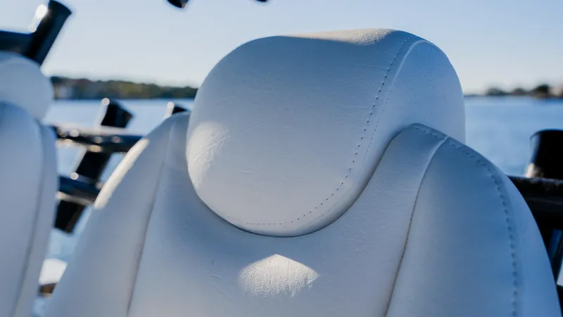 Slide: The Image of White leather seat on a 2020 Freeman 34VH boat. - 20