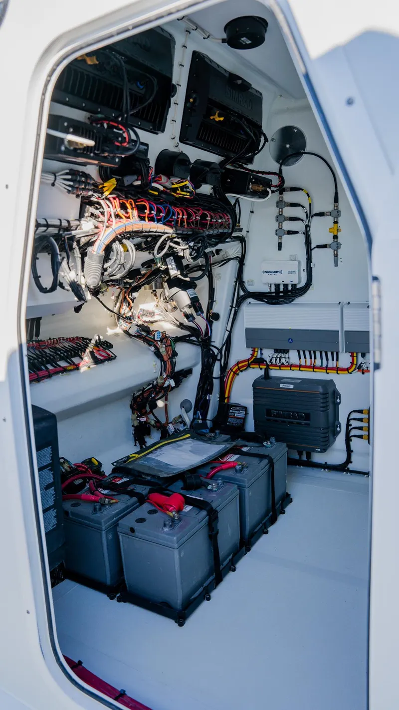 Slide: The Image of Freeman 34VH 2020 model electrical compartment with batteries and wiring. - 22