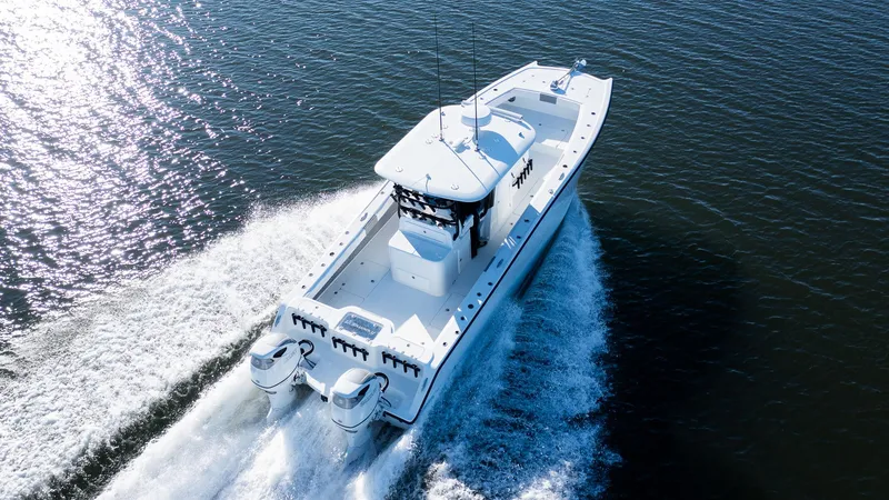 Slide: The Image of Freeman 34VH 2020 boat cruising on open water, aerial view. - 26