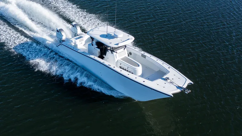 Slide: The Image of Freeman 34VH 2020 model boat cruising on open water. - 6