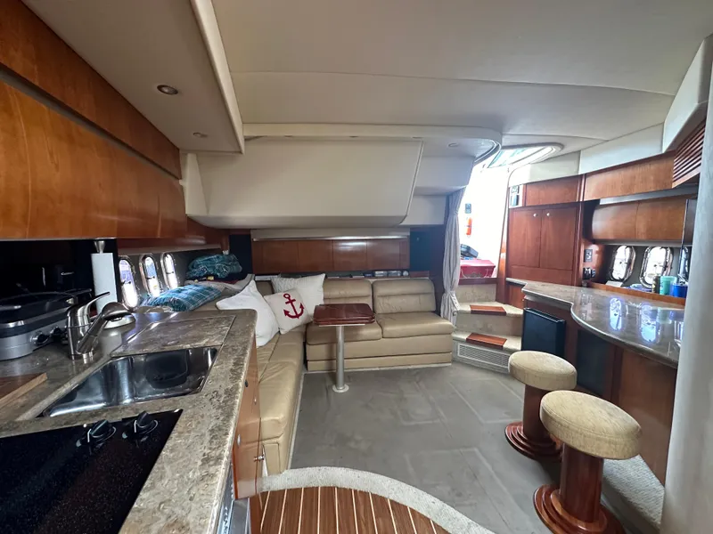 Slide: The Image of Luxurious 2009 Cruisers Yachts 420 Express interior with modern kitchen and cozy seating area. - 21