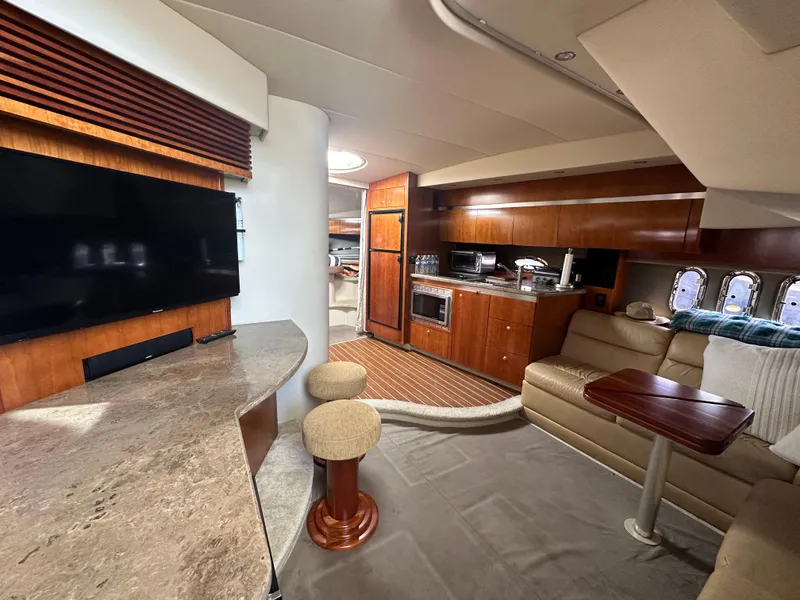 Slide: The Image of Luxurious interior of 2009 Cruisers Yachts 420 Express with modern amenities and elegant design. - 26