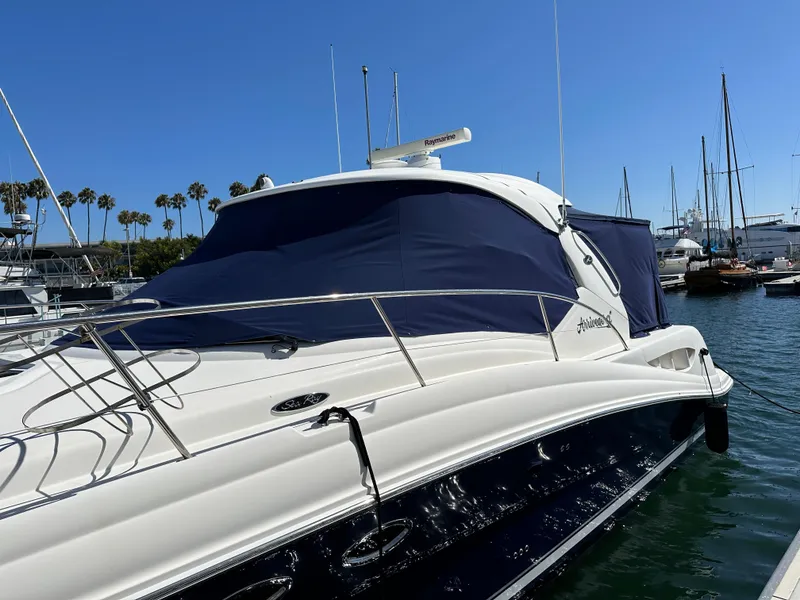 Slide: The Image of 2005 Sea Ray 420 Sundancer yacht docked in sunny marina. - 3