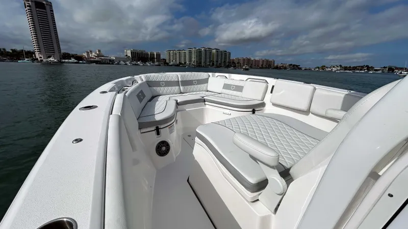 Slide: The Image of 2024 Sea Fox 268 Commander boat with luxurious seating on a sunny day. - 12