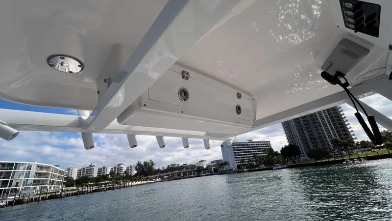 Slide: The Image of 2024 Sea Fox 268 Commander boat with city skyline in the background. - 17