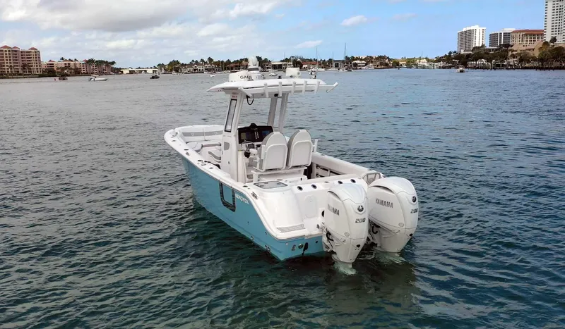 Slide: The Image of 2024 Sea Fox 268 Commander boat with twin Yamaha engines on the water. - 4