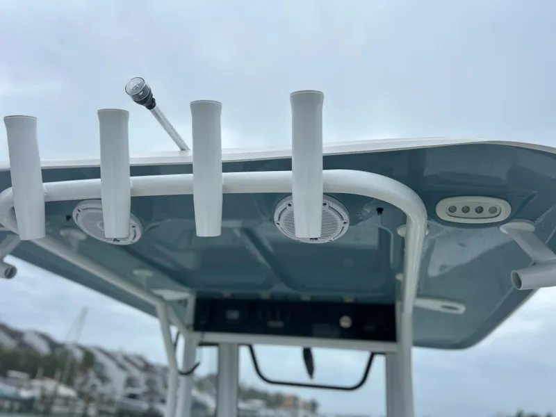 Slide: The Image of 2024 Sea Hunt Gamefish 27 T-top with rod holders and speakers. - 13