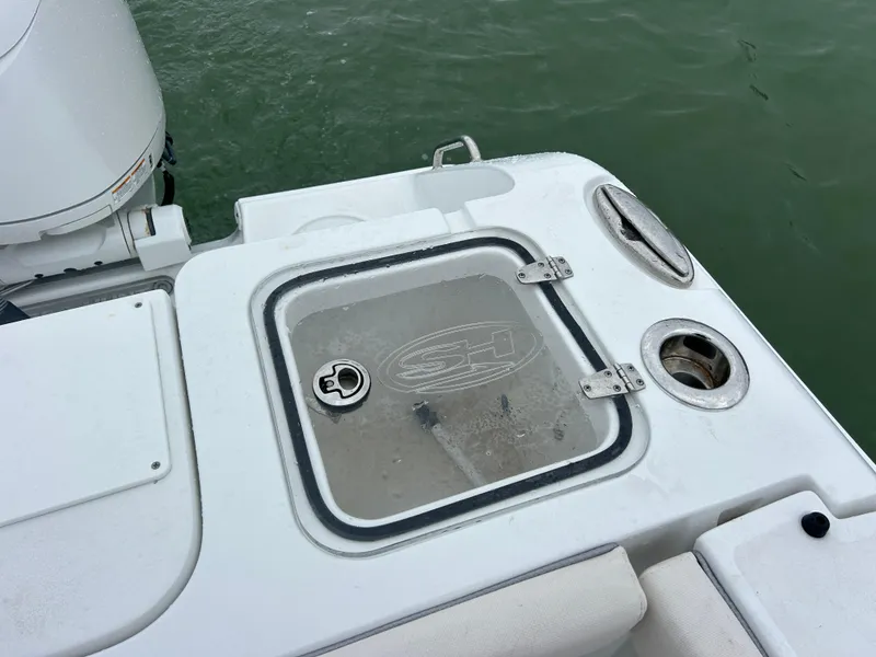 Slide: The Image of 2024 Sea Hunt Gamefish 27 boat deck with coffin box, featuring a sleek design. - 33