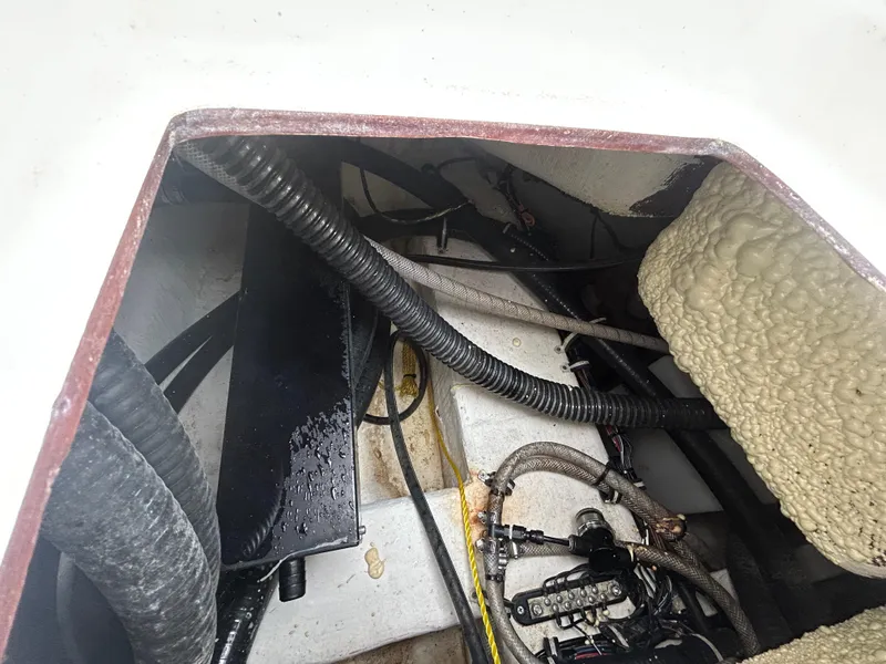 Slide: The Image of 2024 Sea Hunt Gamefish 27 interior wiring and components view. - 36