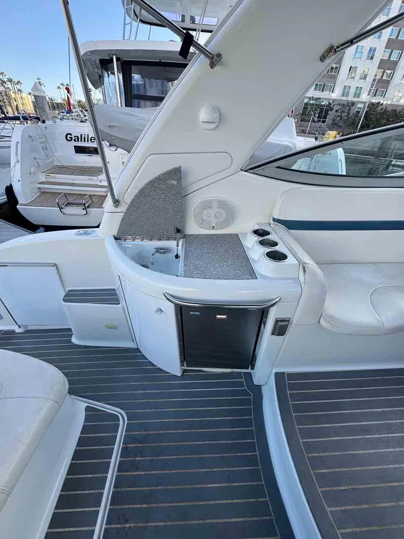 Slide: The Image of 2005 Formula 31 Performance Cruiser interior with kitchenette and seating area. - 17