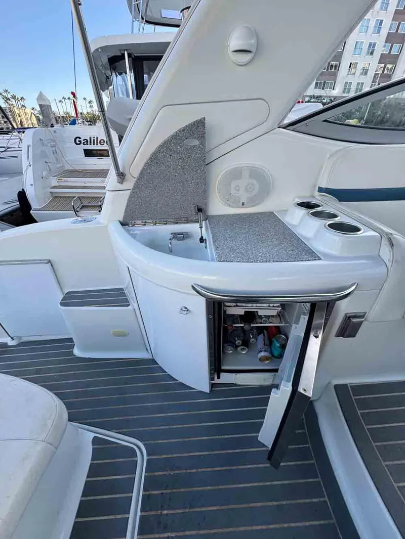 Slide: The Image of 2005 Formula 31 Performance Cruiser with open cockpit kitchenette and storage. - 18