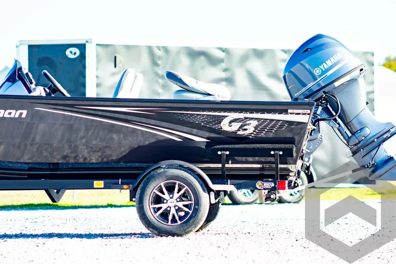 Slide: The Image of 2025 G3 Sportsman 1610 boat with Yamaha motor on a trailer. - 11