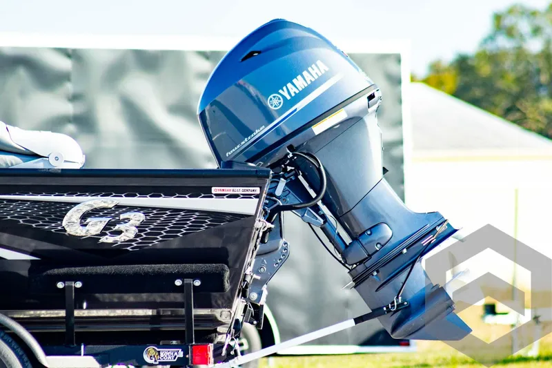 Slide: The Image of 2025 G3 Sportsman 1610 boat with Yamaha outboard motor, side view. - 13