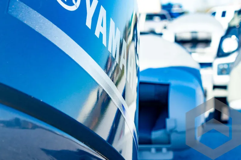 Slide: The Image of Close-up of Yamaha engine on 2025 G3 Sportsman 1610 boat. - 25