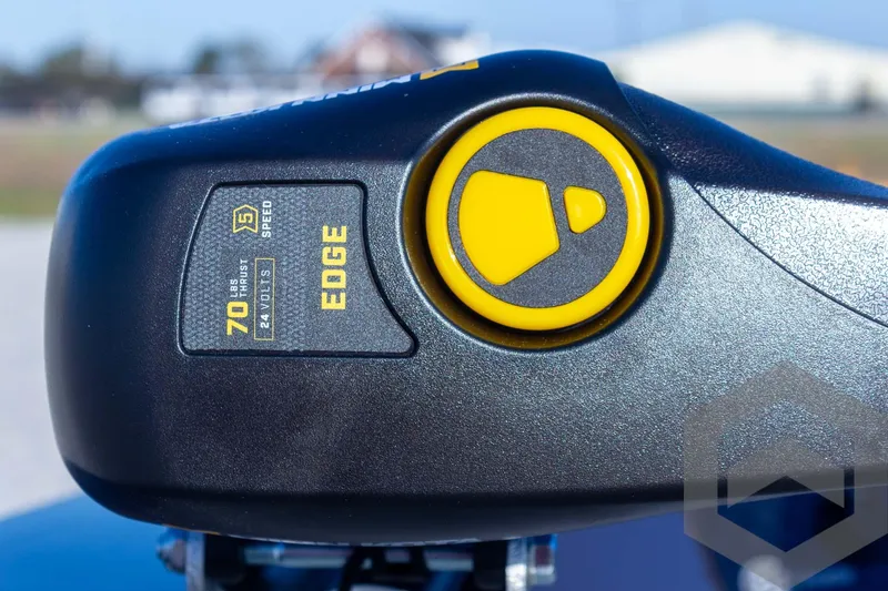 Slide: The Image of Close-up of 2025 G3 Sportsman 1610 motor control with yellow button and "EDGE" label. - 29