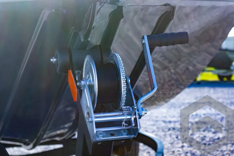 Slide: The Image of Close-up of a 2025 G3 Sportsman 1610 boat winch mechanism. - 32