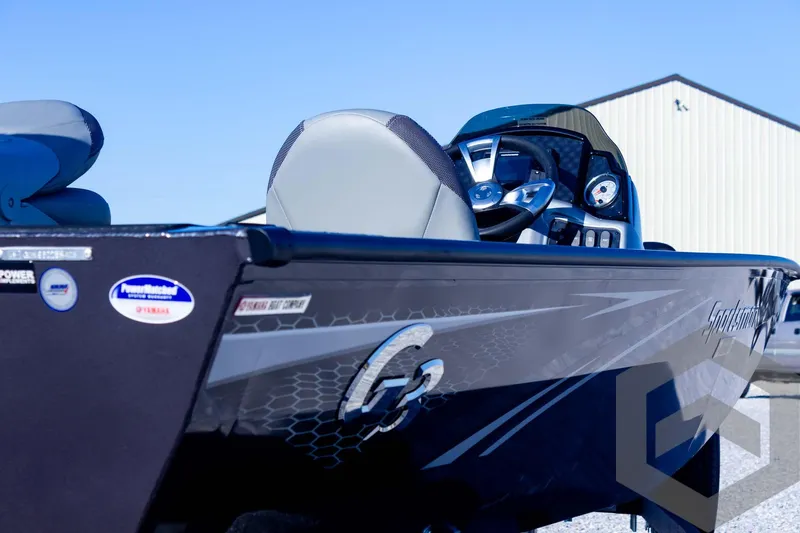 Slide: The Image of 2025 G3 Sportsman 1610 boat, sleek design, modern dashboard, parked outdoors. - 35