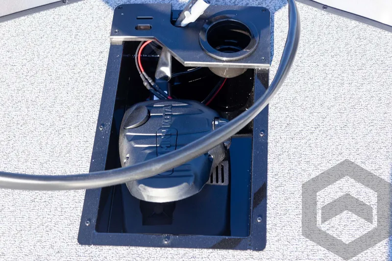 Slide: The Image of 2025 G3 Sportsman 1610 boat compartment with wiring and cup holder. - 48