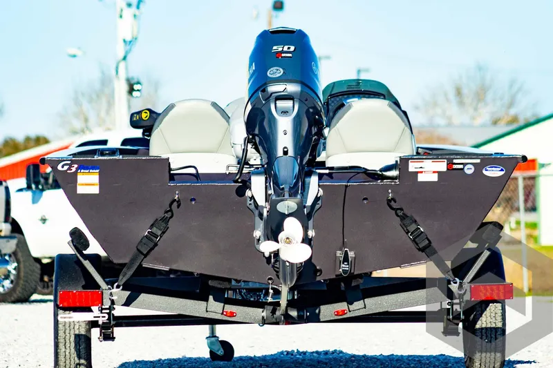 Slide: The Image of 2025 G3 Sportsman 1610 boat with powerful outboard motor on trailer. - 9