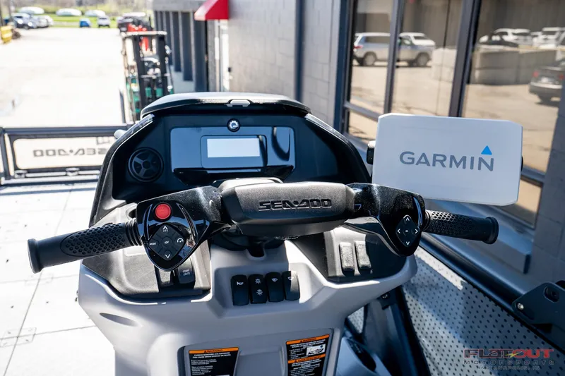 Slide: The Image of 2024 Sea-Doo Switch SPORT 21 dashboard with Garmin navigation system. - 10