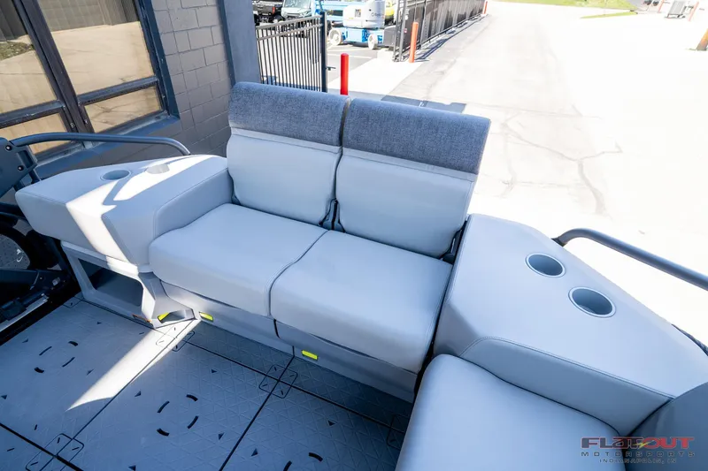 Slide: The Image of 2024 Sea-Doo Switch SPORT 21 interior seating with cup holders, showcasing modern design. - 14