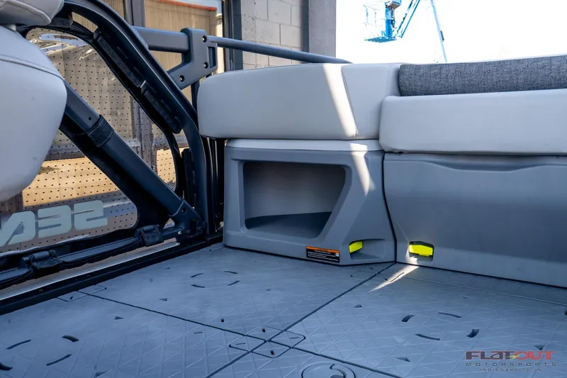 Slide: The Image of Interior view of 2024 Sea-Doo Switch SPORT 21, showcasing seating and storage area. - 17