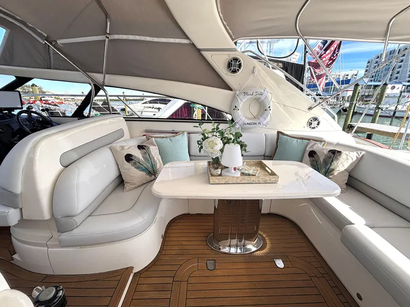 Slide: The Image of Luxurious 2005 Viking Princess V50 yacht interior with elegant seating and table. - 2