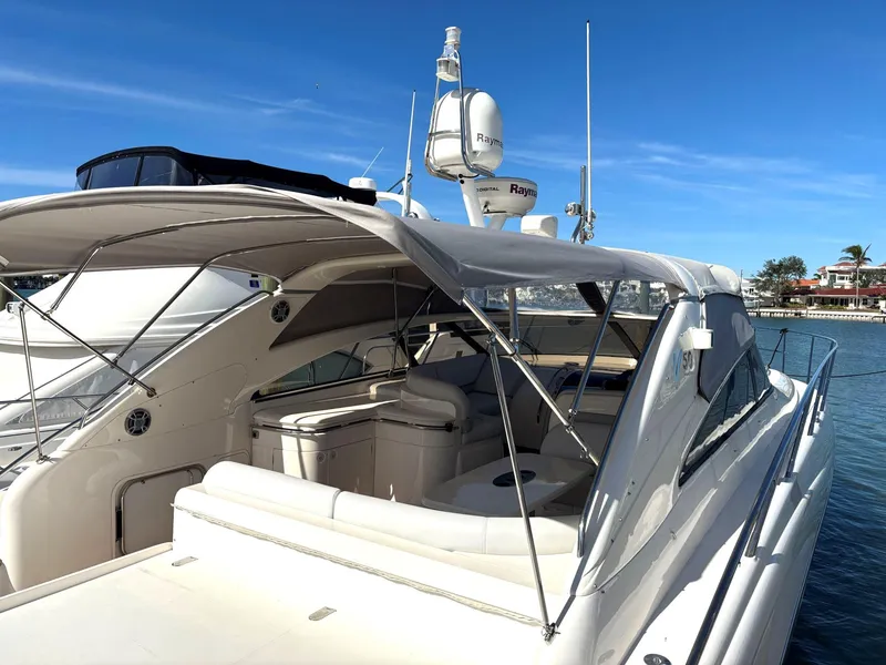 Slide: The Image of 2005 Viking Princess V50 yacht docked under clear blue sky. - 21