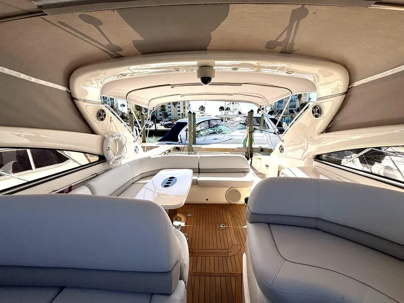 Slide: The Image of Luxurious 2005 Viking Princess V50 yacht interior with elegant seating and wood flooring. - 26