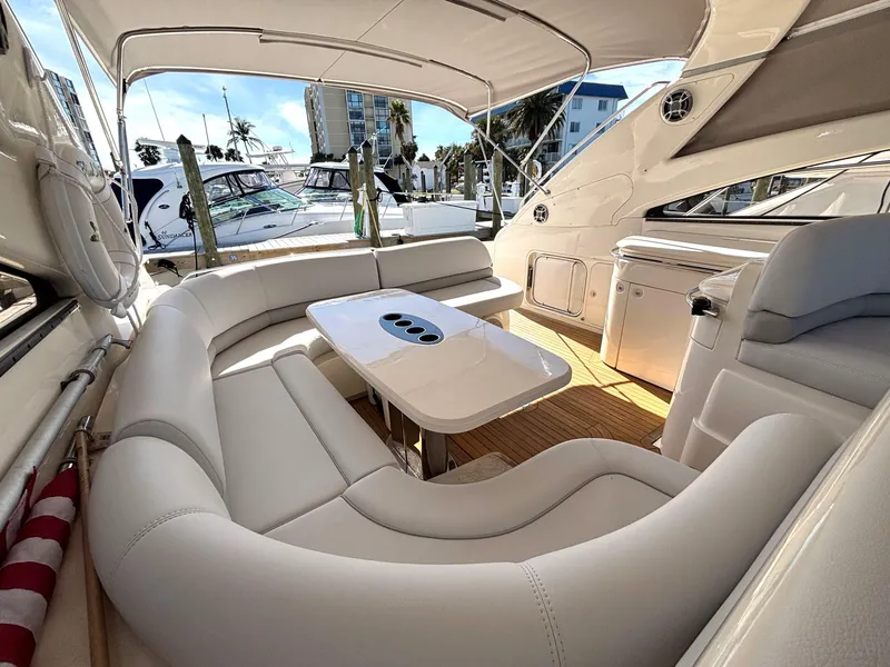 Slide: The Image of Luxurious 2005 Viking Princess V50 yacht interior with elegant seating and table. - 30