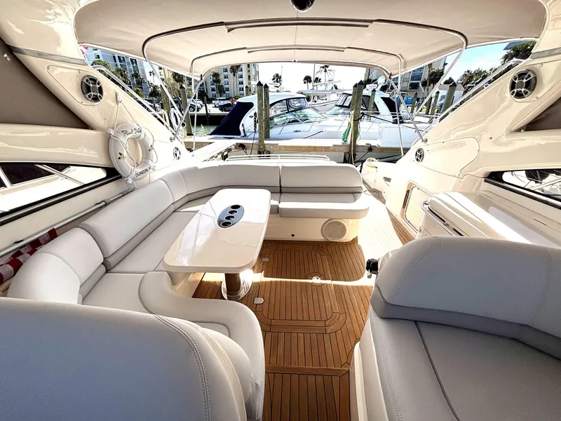 Slide: The Image of Luxurious 2005 Viking Princess V50 yacht interior with elegant seating and wooden flooring. - 31