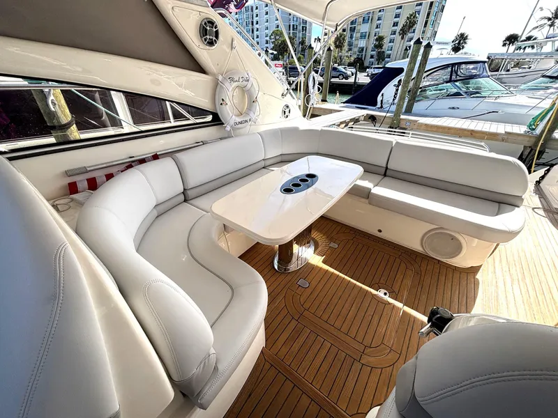 Slide: The Image of Luxurious 2005 Viking Princess V50 yacht interior with elegant seating and table. - 32