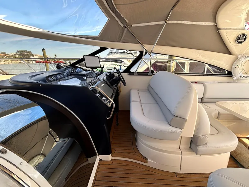 Slide: The Image of Interior of 2005 Viking Princess V50 yacht with sleek helm and comfortable seating. - 40