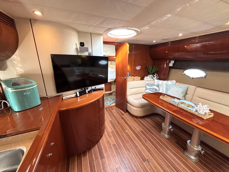 Slide: The Image of Luxurious 2005 Viking Princess V50 yacht interior with wood flooring and modern amenities. - 52