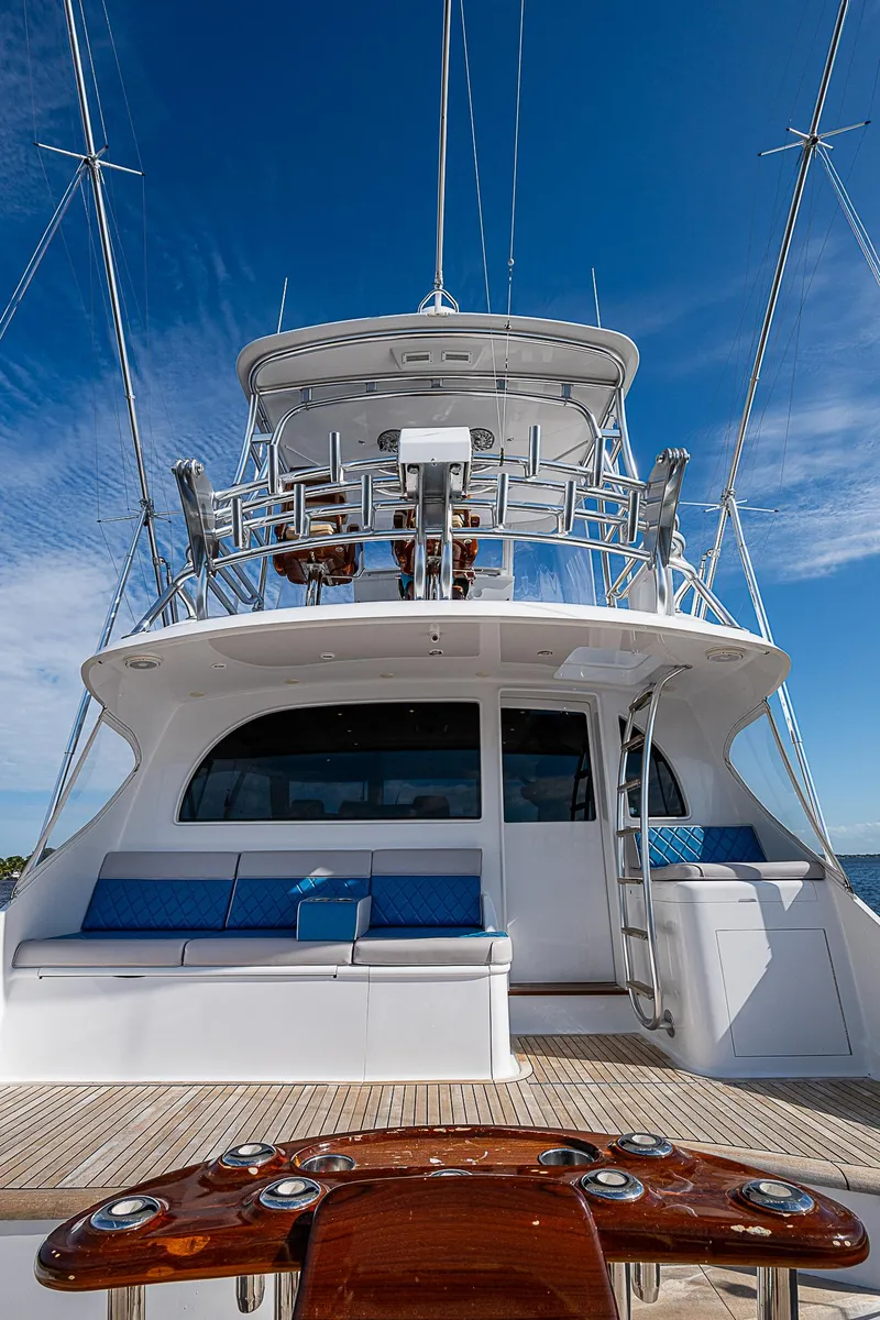 Slide: The Image of 2017 F&S Custom Express Sportfish yacht with blue seating and sleek design. - 10