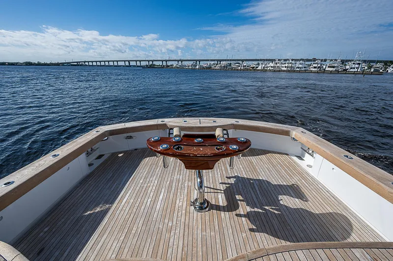 Slide: The Image of 2017 F&S Custom Express Sportfish boat deck with ocean view and marina in background. - 14